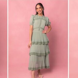 Sage green midi gown, perfect for bridesmaid or summer wedding guest